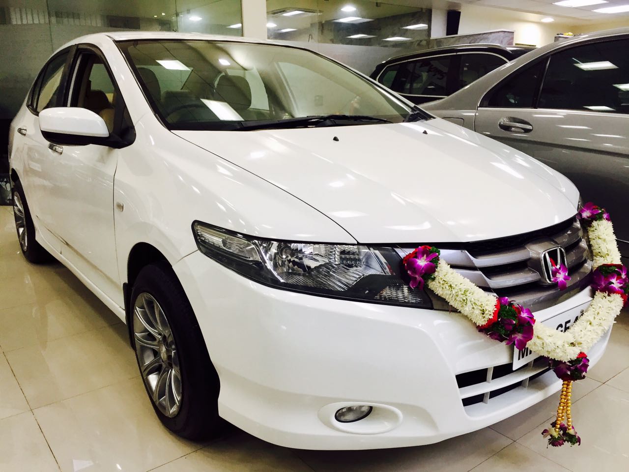 Director of Pokket Cafe gets a Honda City V mt from AutoGenius
